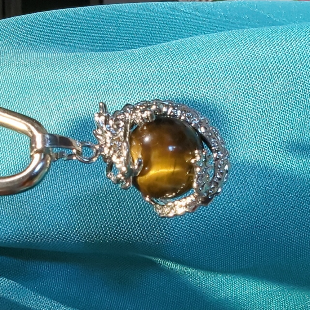 Dragon pendant with tiger eye mineral